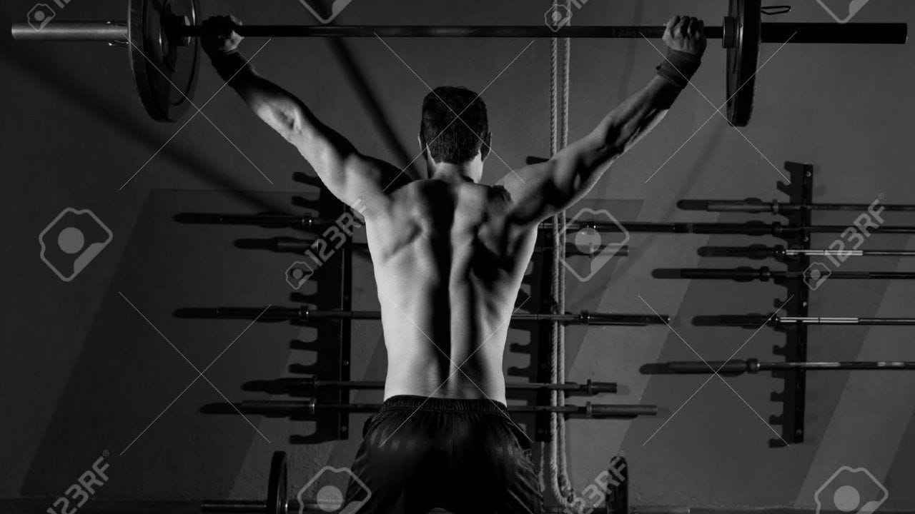 27491186-barbell-weight-lifting-man-rear-view-back-workout-exercise-at-gym-box-stock-photo