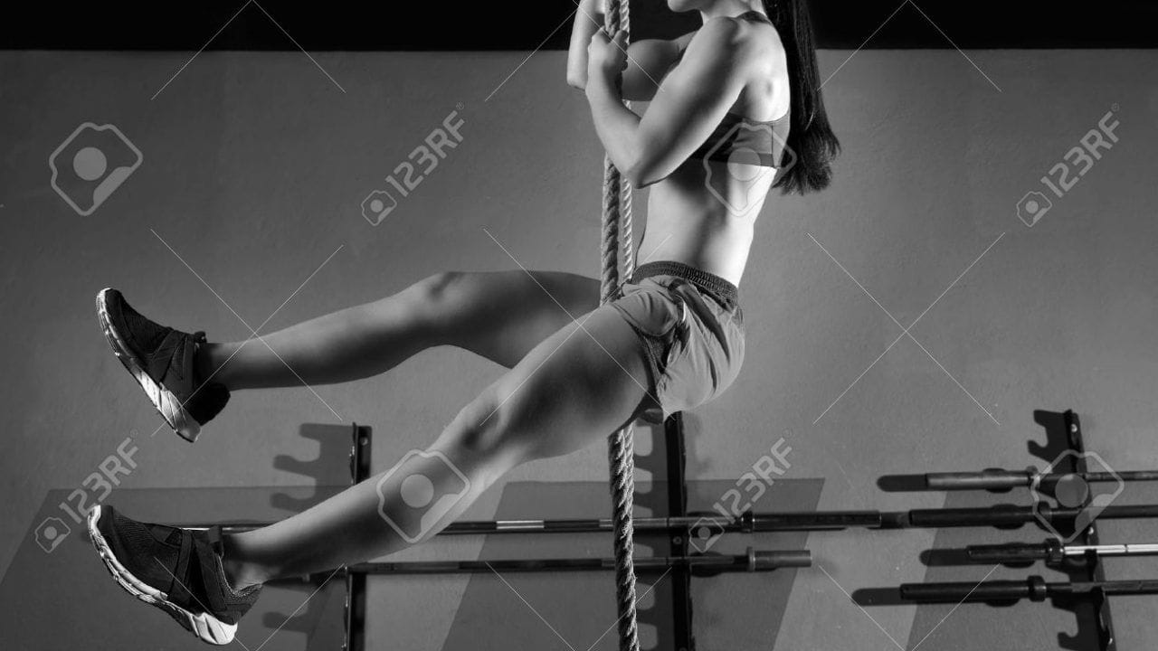 27491406-rope-climb-exercise-woman-workout-at-gym-climbing-stock-photo-crossfit